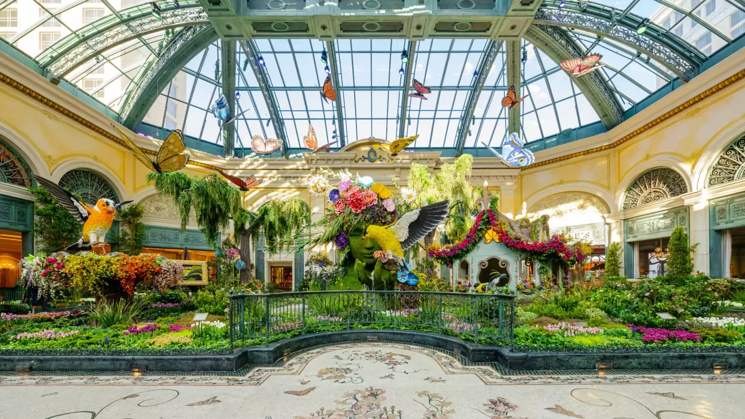 The stunning Bellagio Conservatory botanical garden with seasonal floral displays under a glass ceiling